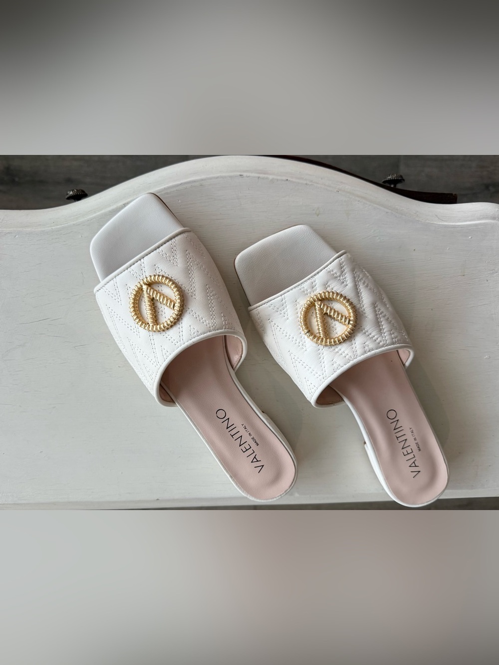 Valentino White Quilted Slide Mules with Gold Medallion